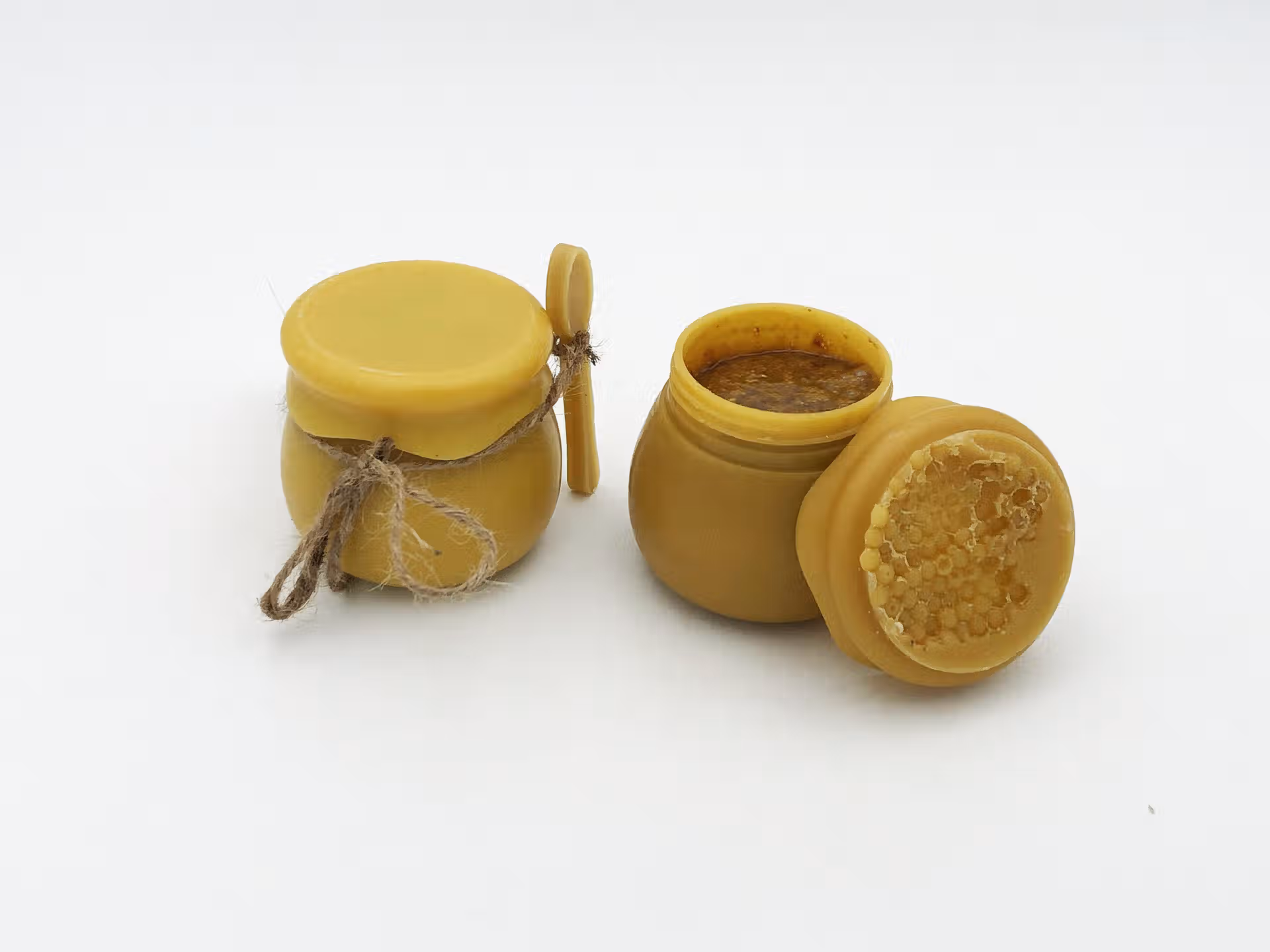 Pot miel en cire d'abeille deux fond blanc